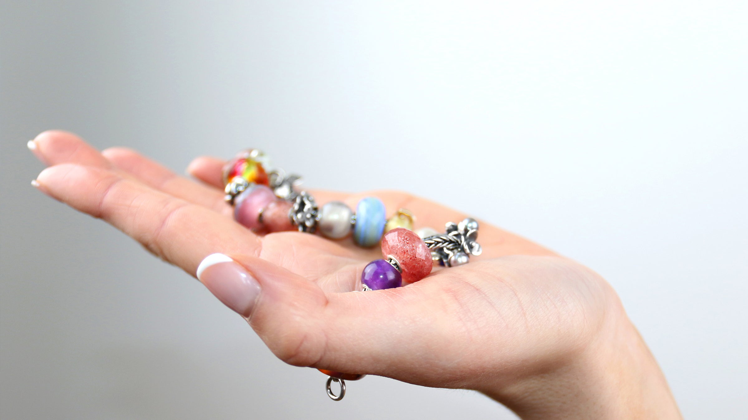 Colorful beads on sterling silver bracelet